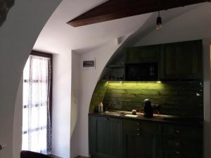 A kitchen or kitchenette at Kálium Vendégház