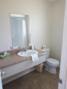Ванная комната в Motel & Chalets Baie de Gaspé
