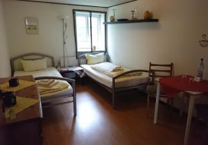 
Ein Bett oder Betten in einem Zimmer der Unterkunft Ferienzimmervermietung Reitferien
