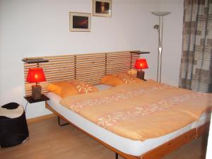 Postel nebo postele na pokoji v ubytování Résidence Castel Club Leysin Parc