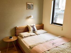Postel nebo postele na pokoji v ubytování Mini inn Nara- - - 英語予約限定