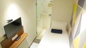TV o dispositivi per l'intrattenimento presso Subwow Hostel
