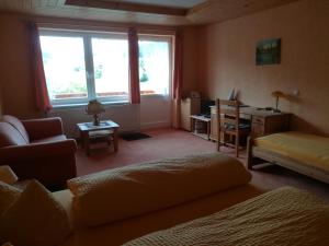 Postel nebo postele na pokoji v ubytování Hotel Kaltenbach