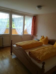 Postel nebo postele na pokoji v ubytování Hotel Kaltenbach