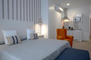 Posteľ alebo postele v izbe v ubytovaní Hotel Apartamentos MPD
