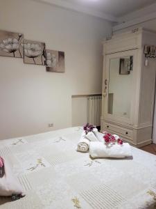 A bed or beds in a room at Il Salotto di via Giulia