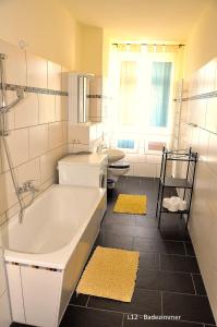 Koupelna v ubytování Haus Ludwig + 46 fotografií