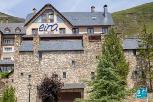 a building with an inn on top of it at Eira Ski Lodge in Baqueira-Beret