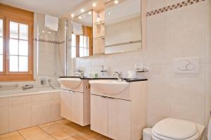 Bilik mandi di Apartment Paradise - GRIWA RENT AG