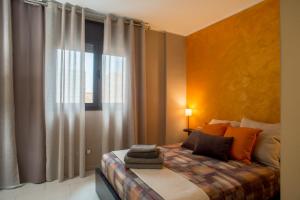 Ένα ή περισσότερα κρεβάτια σε δωμάτιο στο Pep Ventura Apartament - Llave inteligente