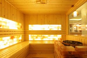 a sauna with a tub in the middle at Minh Tam Hotel & Spa 3/2 in Ho Chi Minh City