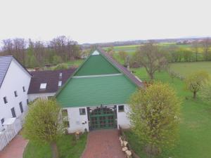 an overhead view of a green and white building at Reiterhof Zwei Linden in Melle