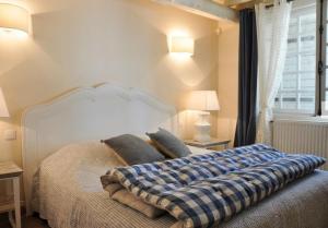 Ένα ή περισσότερα κρεβάτια σε δωμάτιο στο Mas Le 7 +52 φωτογραφίες