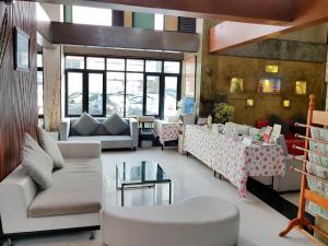 Posezení v ubytování Izen Budget Hotel & Residence