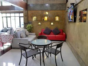 Posezení v ubytování Izen Budget Hotel & Residence