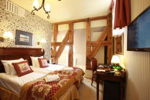 Posteľ alebo postele v izbe v ubytovaní Hotel St. Bruno