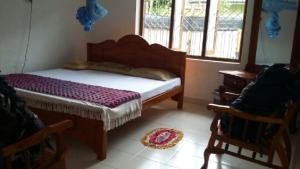 Letto o letti in una camera di Bimanjee Mango Resort