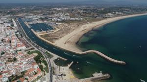 an aerial view of a beach and the ocean at Racing Mackerel Hostel in Lagos