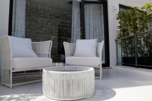 Ein Sitzbereich in der Unterkunft LBV House Hotel