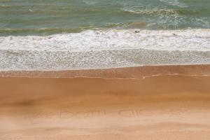 an overhead view of the beach with the ocean at Hotel Ponta do Madeiro in Pipa