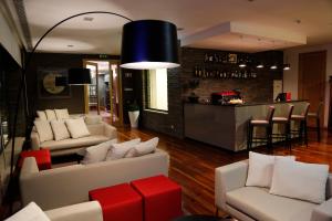 Ein Sitzbereich in der Unterkunft LBV House Hotel