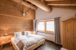 Ein Bett oder Betten in einem Zimmer der Unterkunft Hotel Suretta