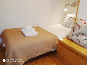 Ein Bett oder Betten in einem Zimmer der Unterkunft Pure Lisbon Loft里斯本特色阁楼公寓