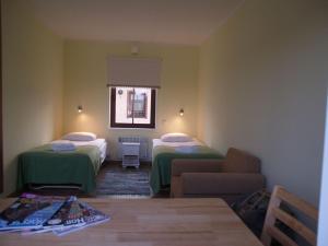 Кровать или кровати в номере Maria Talu Guesthouse