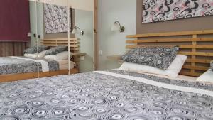 Voodi või voodid majutusasutuse Apartman VEGA toas