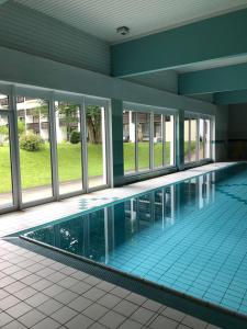Bazén v ubytování Studio Lofer mit Garten und Schwimmbad nebo v jeho okolí