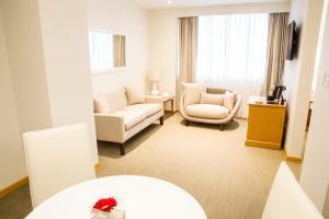 Rúm í herbergi á Hotel Melia Lima