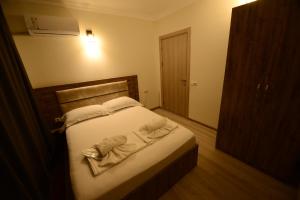 Postel nebo postele na pokoji v ubytování Hotel Aristocrat Batumi