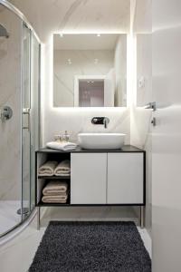 Ένα μπάνιο στο Apartments Vincero