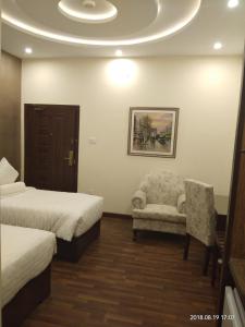 Postel nebo postele na pokoji v ubytování S Chalet Multan