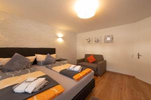 A bed or beds in a room at Ferienwohnung - Bergblick - Vandans