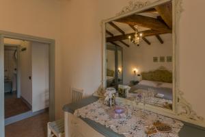 Postel nebo postele na pokoji v ubytování Casa il Castello