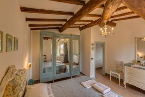 Postel nebo postele na pokoji v ubytování Casa il Castello