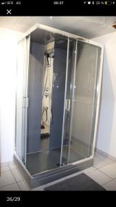 a shower stall with a glass door in a bathroom at Spacieux gîte jusqu'à 12 personnes in Ammerschwihr +18 photos