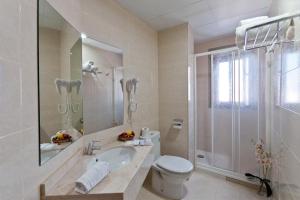 Koupelna v ubytování Hotel Verol