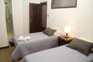 Cama o camas de una habitación en Nativa suites