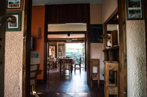 an open door to a dining room with a table at Casa Calchaqui in Yerba Buena