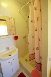 Ванная комната в Guest House Uyutniy Dvorik