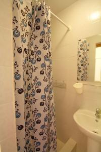 Ванная комната в Guest House Uyutniy Dvorik