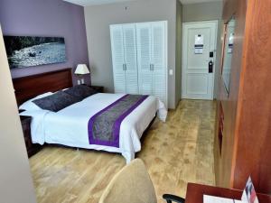 Postel nebo postele na pokoji v ubytování Mercure Alameda Quito