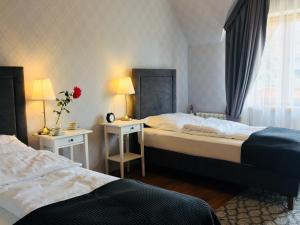 Posteľ alebo postele v izbe v ubytovaní Apartamenty w Jurgowie Świstokówka