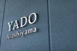 a close up of a yoda insignia on a car door at Yado Arashiyama -13 years old or older only- in Kyoto