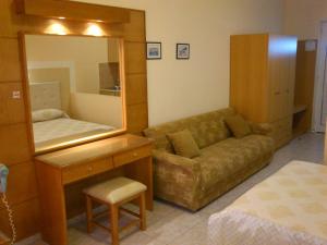 A bed or beds in a room at Summer Memories Aparthotel