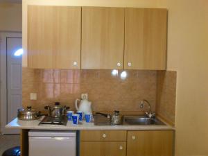 A kitchen or kitchenette at Summer Memories Aparthotel