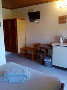 A television and/or entertainment centre at Pansion Matoula
