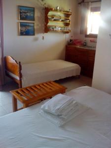 A bed or beds in a room at Pansion Matoula